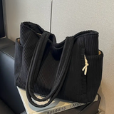 Tilda – Bolsa de mano acanalada con detalle de cordón