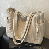 Tilda – Bolsa de mano acanalada con detalle de cordón